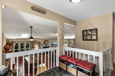 Foyer overlooks the dining/living room