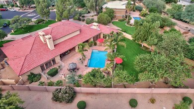1/2 acre+ lot with backyard paradise