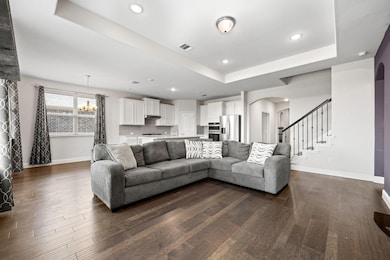 Living room featuring dark hardwood / wood-style f