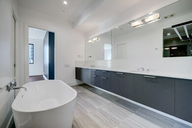 Unwind in the freestanding soaking tub or rejuvena