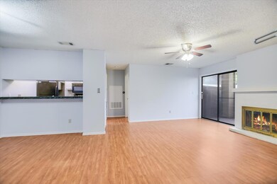 Unfurnished living room with a textured ceiling, 