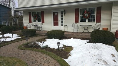 Relax on your front, brick porch !!   Easy care la
