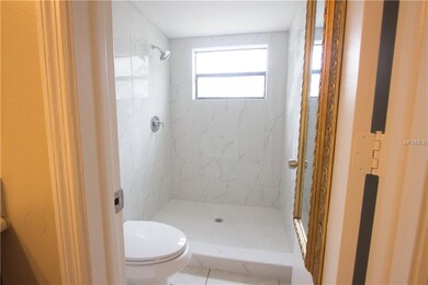 Master shower and commode room