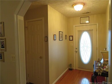 Foyer with Hardwood Flooring