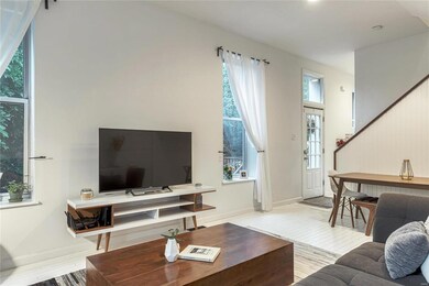 White washed hard wood flooring on main level.