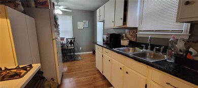 Spacious eat-in kitchen with lots of cupboard and 