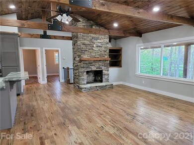 Main Level Living Area Kitchen to the left, full b