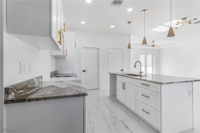 3022 33rd St SW, Lehigh Acres, FL 33976 - photo 4