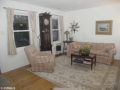 Living Room - Living room with pine plank floor.