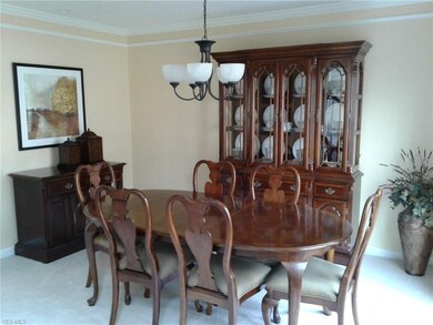 Formal Dining room features crown and shoulder mol