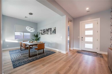 Features formal dining room or den/office