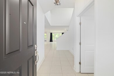 High Ceiling & Tile Floors Throughout!
