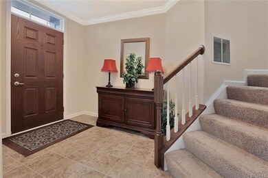 Open, well-lit, tiled foyer