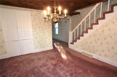 This charming formal dining room has plenty of roo