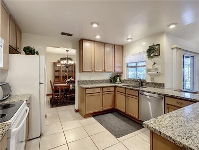 Granite counter tops and wood cabinets