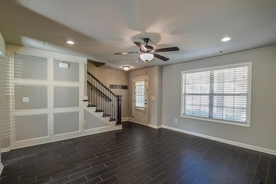 Foyer entrance featuring stairs, recessed lighting, dark wood-style floors, and a ceiling fan