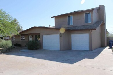 Corner lot!  Tons of parking!  2 garages