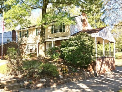 This brick and frame home features a 26x12 concret
