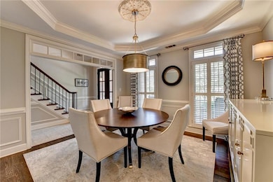 A transitional drum light fixture illuminates your