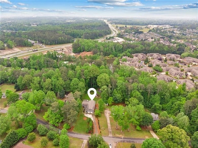 Bird's eye view featuring a wooded view