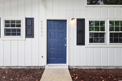Entrance to property with board and batten siding