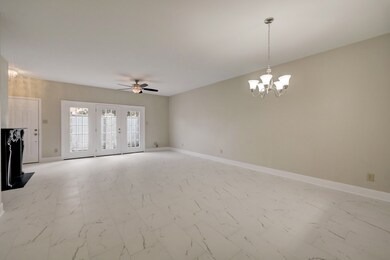 Wall of windows in the living room brings in lots