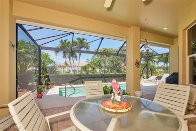 View of patio with a fenced in pool, a lanai, and