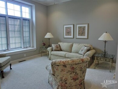 Main floor den with french doors