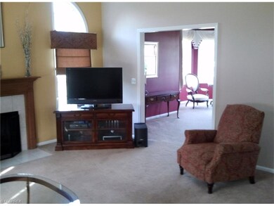 View of great room leading into living room.