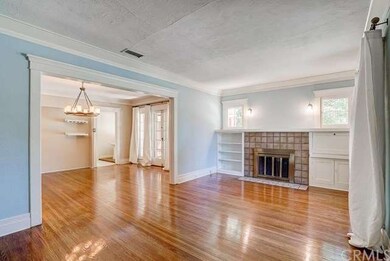 The living room flows nicely into the formal dinin