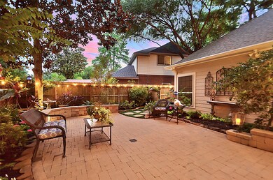 A sitting wall and masterfully planned landscaping draws you in to just sit and take it all in.