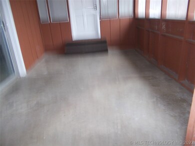 Entry from carport to the sun room