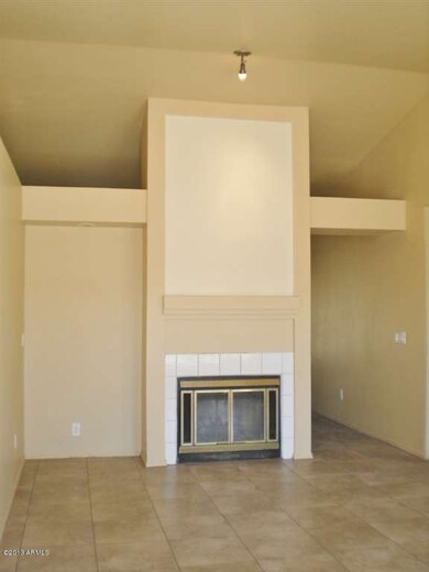5 Formal Living Room & Dual Fireplace