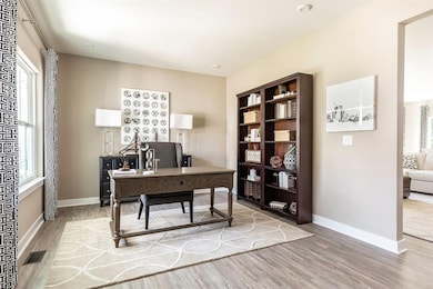 The gorgeous flex area when you enter the home. Sitting area, study, formal dining room...the choice is YOURS!