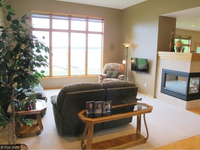 Main Level Living Room with views of the lake and 