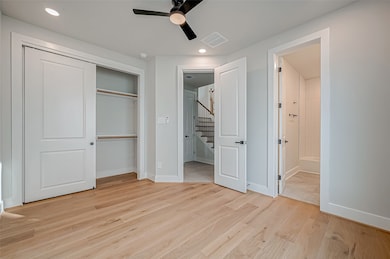 This is a bright, modern bedroom on the first floo