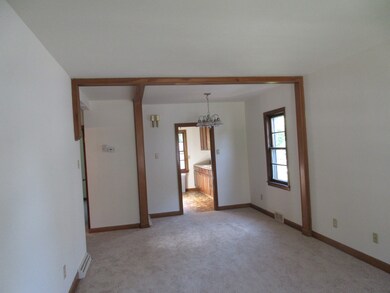 Large living and dining room combination welcomes 