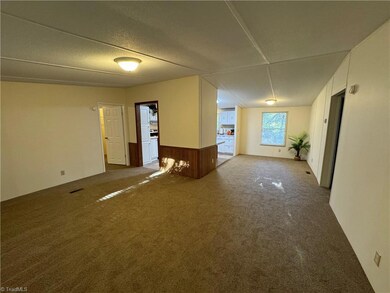 Another view of the great room and dining room