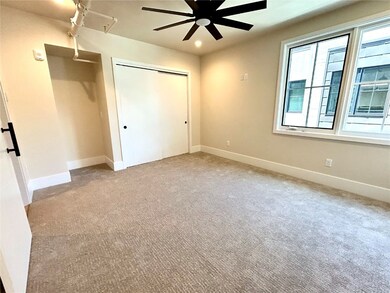 Unfurnished bedroom with carpet, a closet, and cei