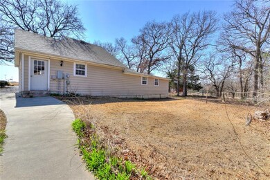 View of the side yard with door from garage.