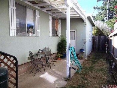 Fenced Back Yard with Entrance to Garage