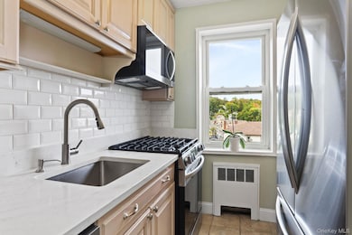 Kitchen with stainless steel appliances.