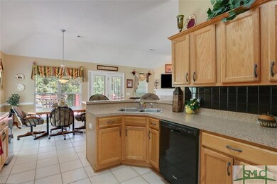 Large kitchen offers loads of counter space and to