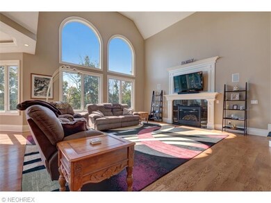 The 2-story Family Room has a gas Fireplace with T