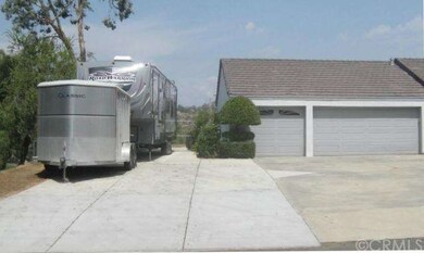RV/trailer/boat parking next to the garage. 82 fee