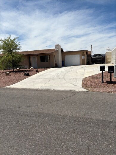 Attached garage, additional concrete driveway,