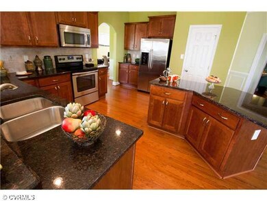 Kitchen - With granite counter tops and stainless 