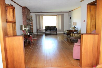 Large Living room open to newer dining room.  Coul
