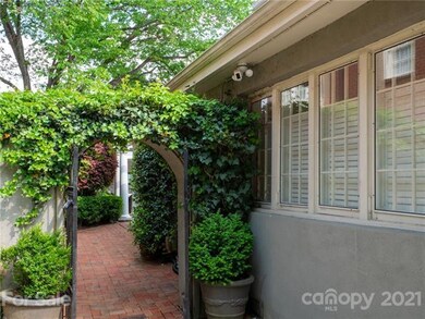 Charming gate leading to the backyard and pool.
