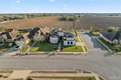 Birds eye view of property featuring a rural view